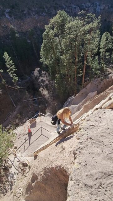 Climbing a cliff dwelling at Bandelier National Monument #vanlife #travel #cliffdwelling #newmexico #nationalpark